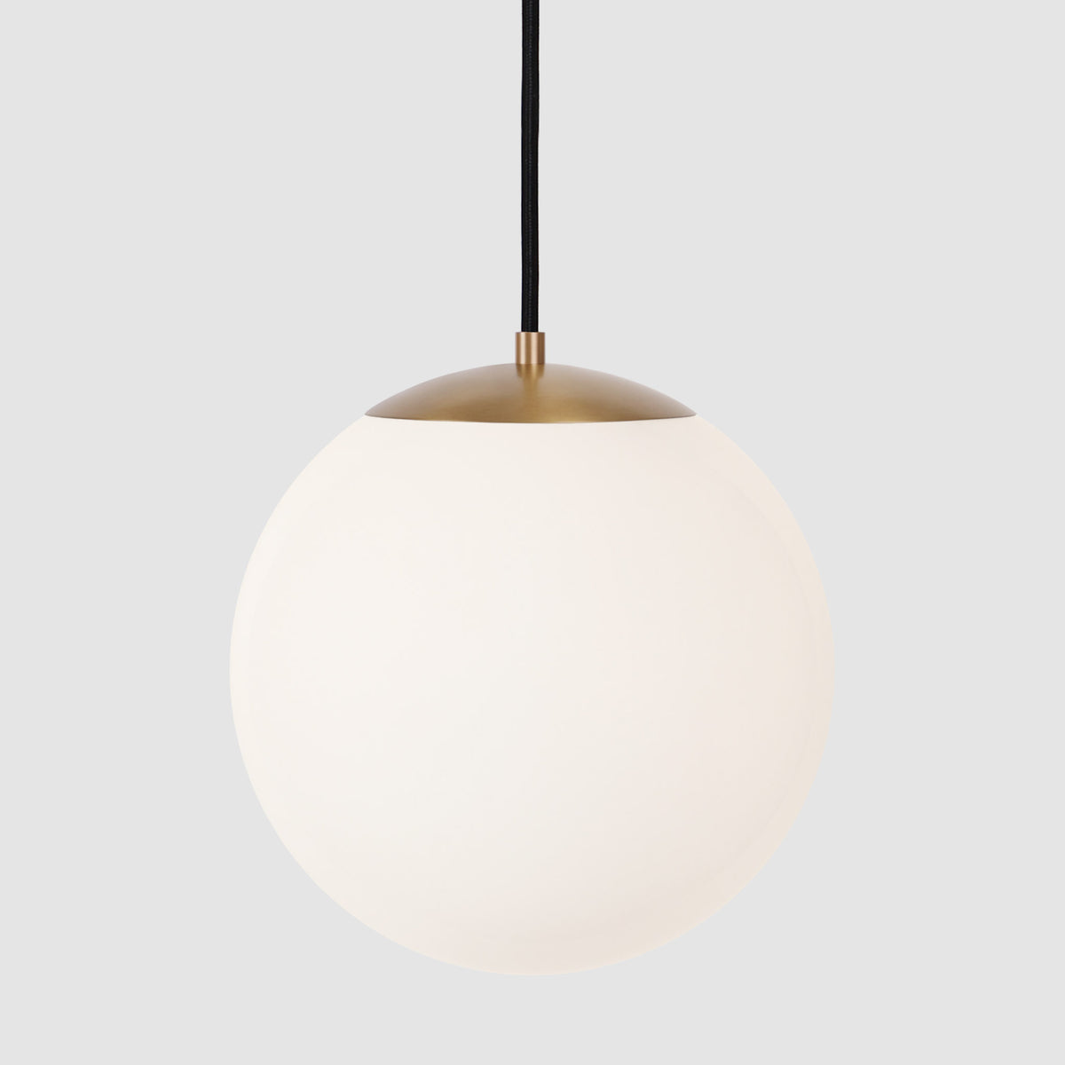 Alto Cord 12” shown in Heirloom Brass with Black Cloth Cord and an Opal 12” Globe
