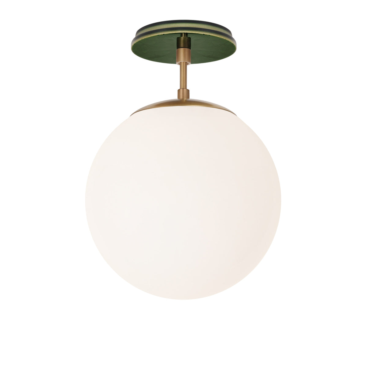 Alto Surface 10” shown in Heirloom Brass with a Forest Green Star Ceramic Canopy