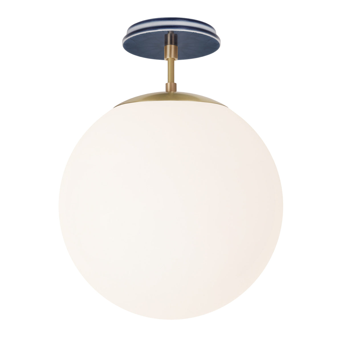 Alto Surface 12” shown in Brass with an Indigo Blue Star Ceramic Canopy