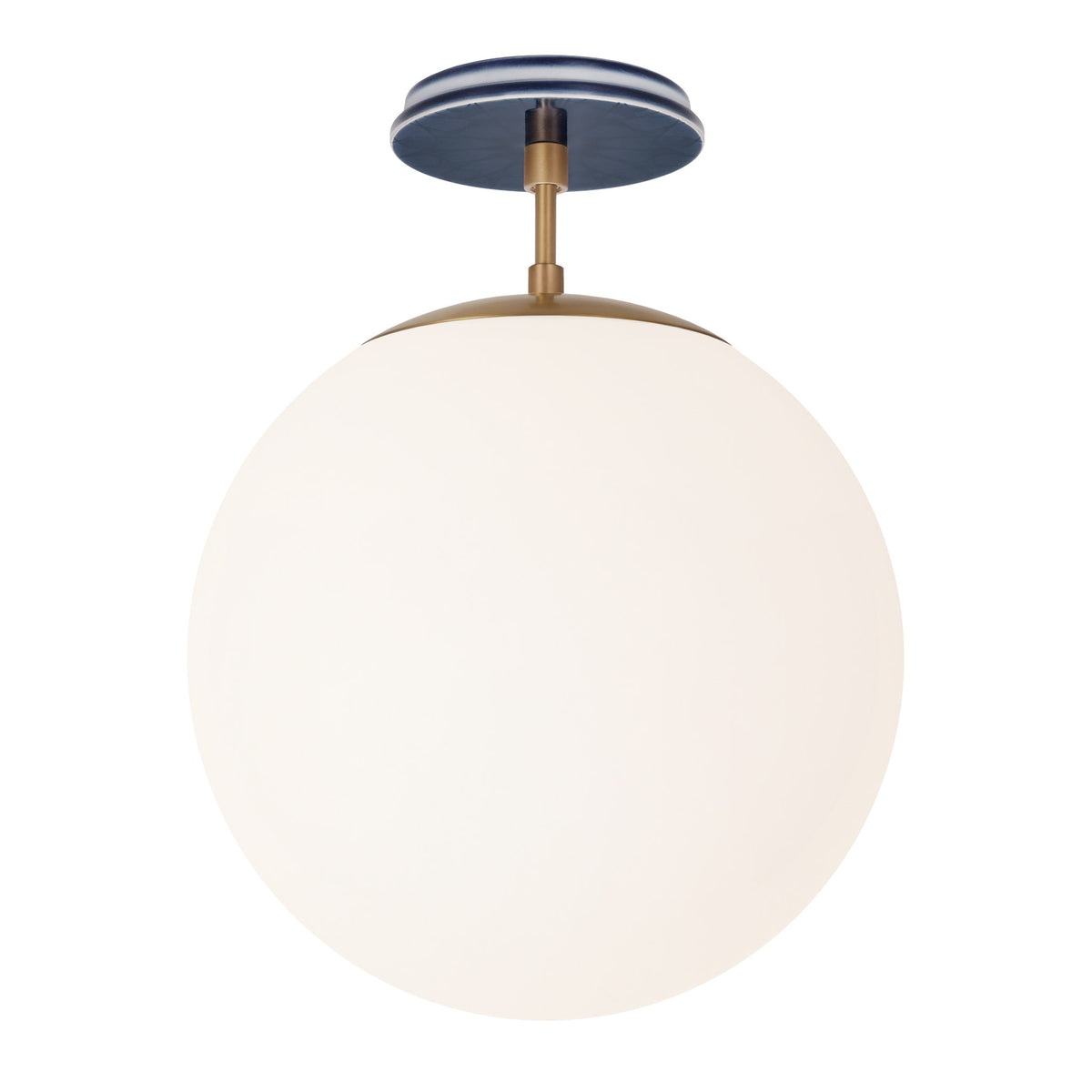 Alto Surface 12” shown in Heirloom Brass with an Indigo Blue Star Ceramic Canopy