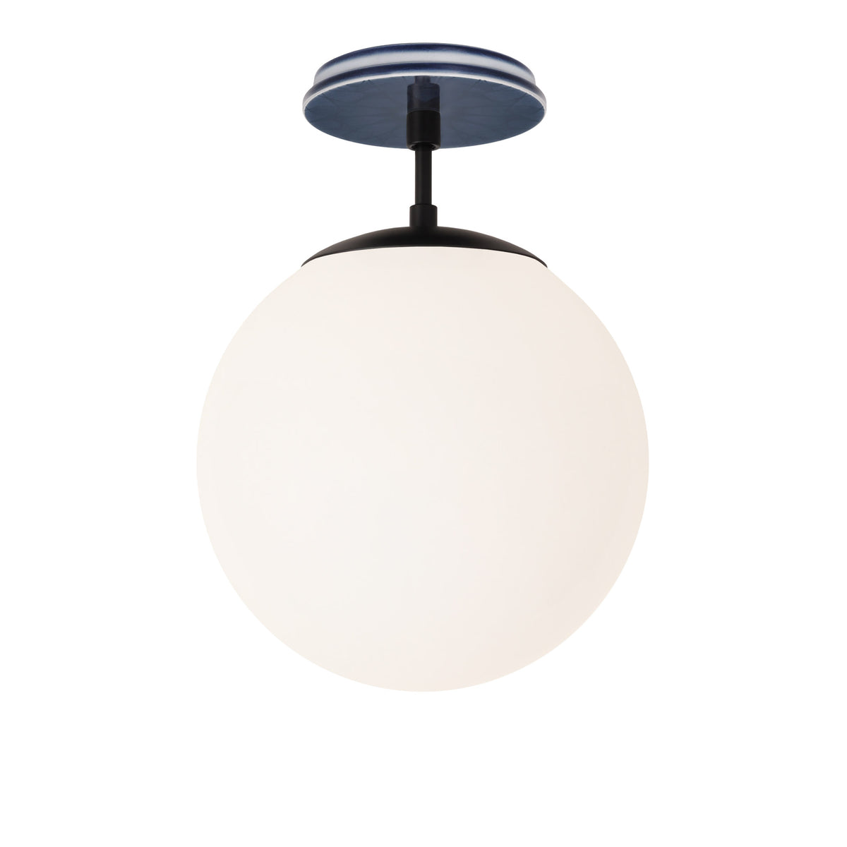 Alto Surface 10” shown in Matte Black with an Indigo Blue Star Ceramic Canopy