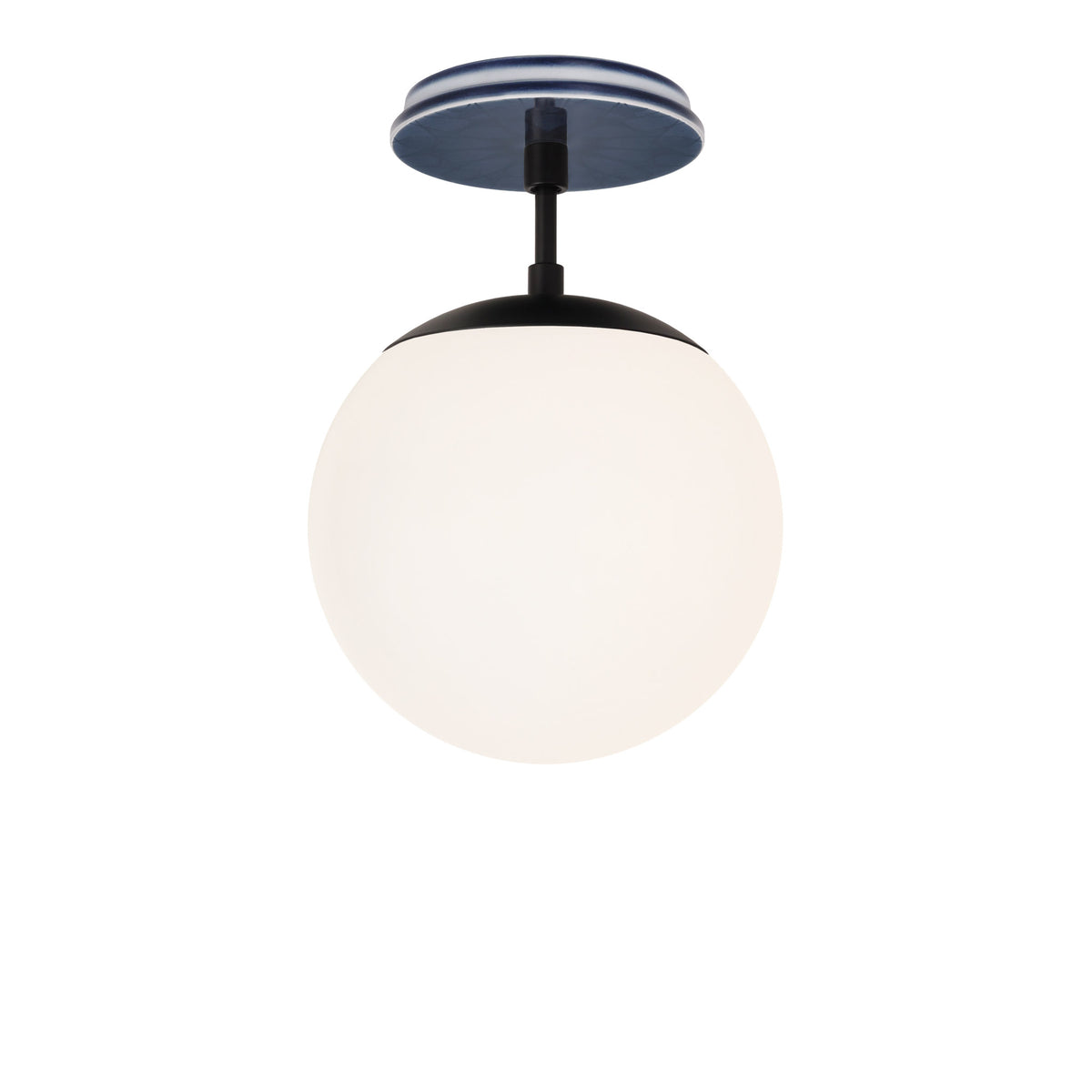 Alto Surface 8" shown in Matte Black with an Indigo Blue Star Ceramic Canopy