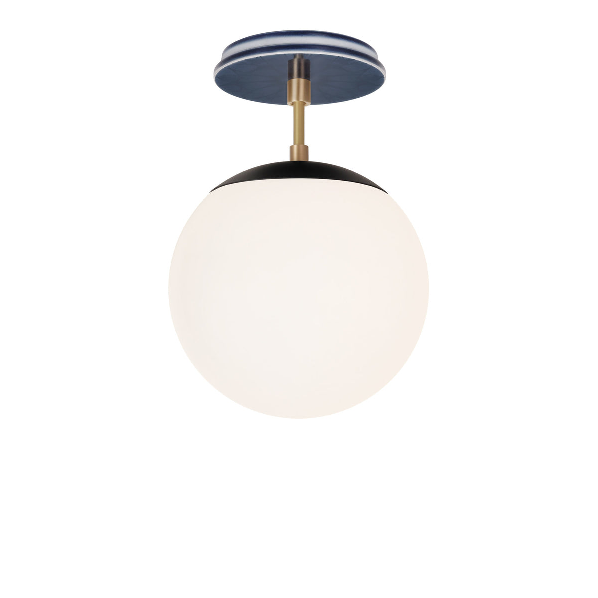 Alto Surface 8" shown in Matte Black with Brass and an Indigo Blue Star Ceramic Canopy
