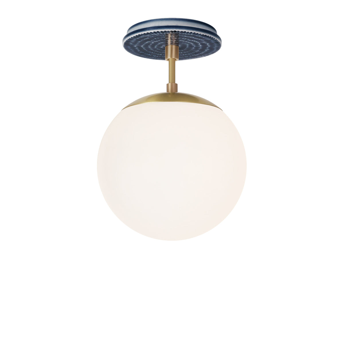 Alto Surface 8" shown in Brass with an Indigo Blue Sunflower Ceramic Canopy