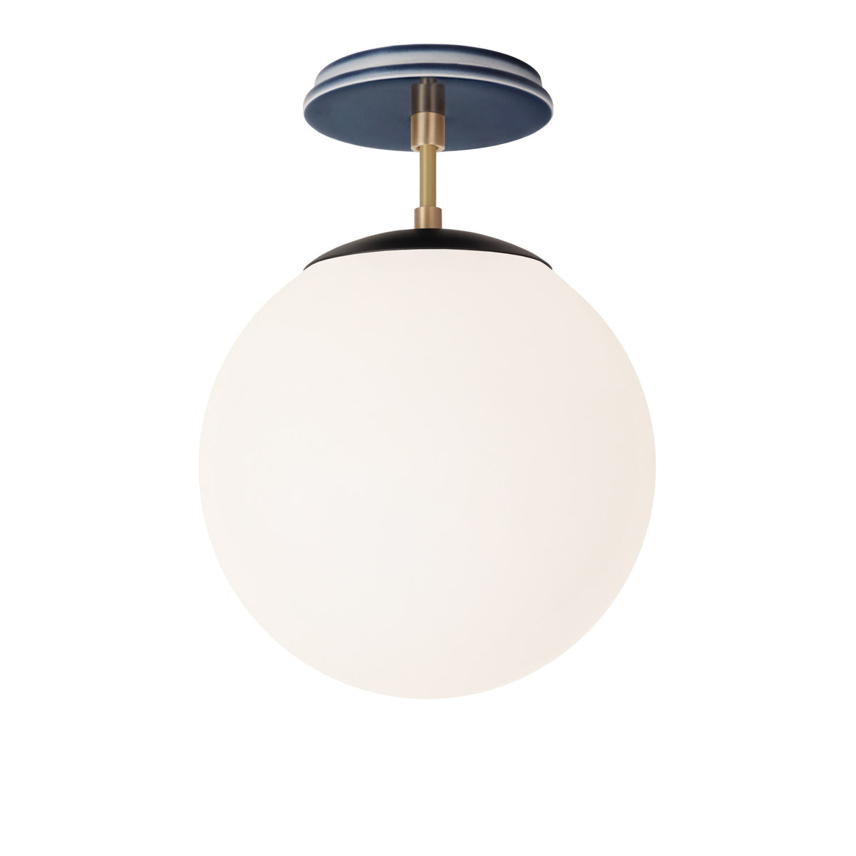 Alto Surface 10” shown in Matte Black with Brass and an Indigo Blue Swift Ceramic Canopy