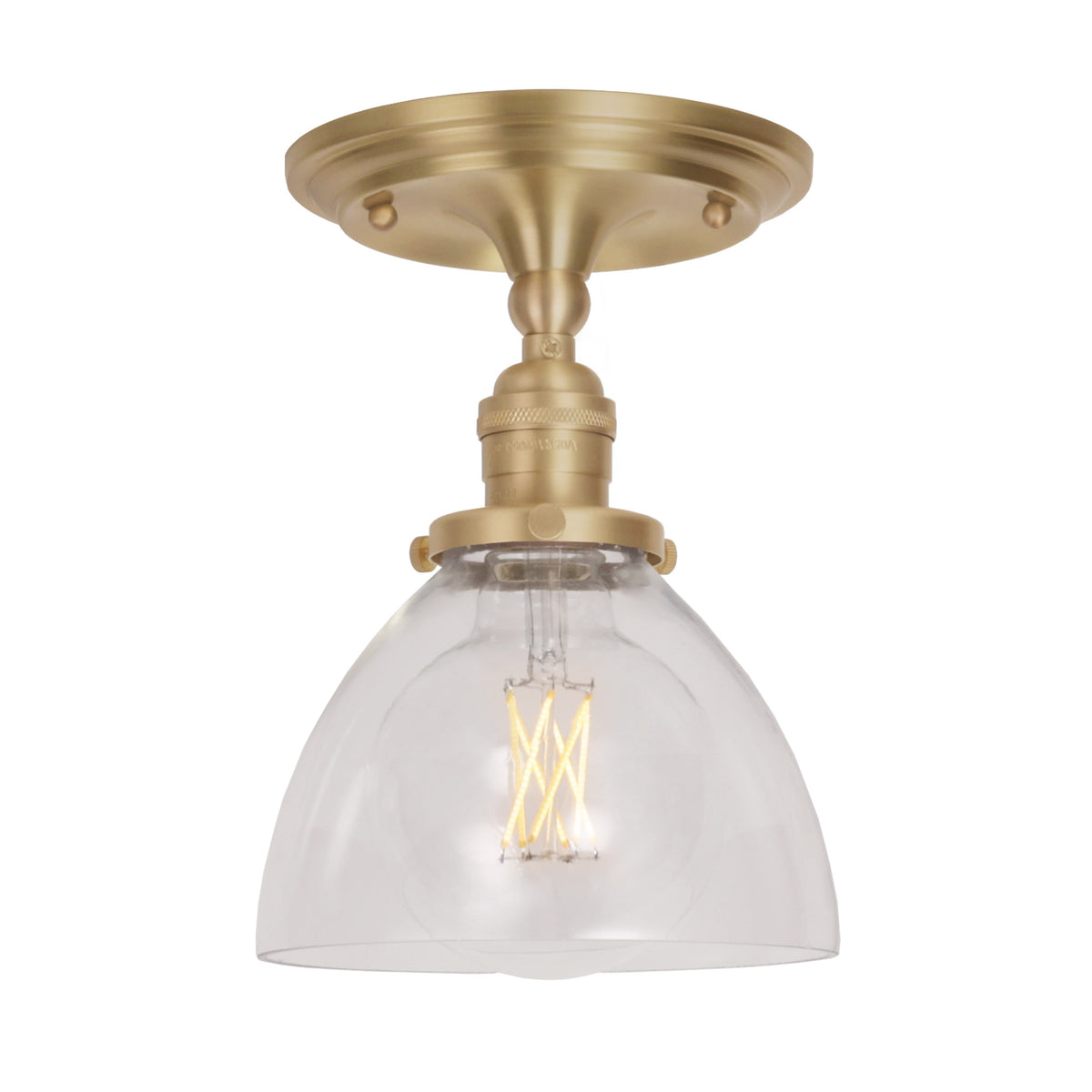 Grace Surface shown in Brass with a Clear Glass shade