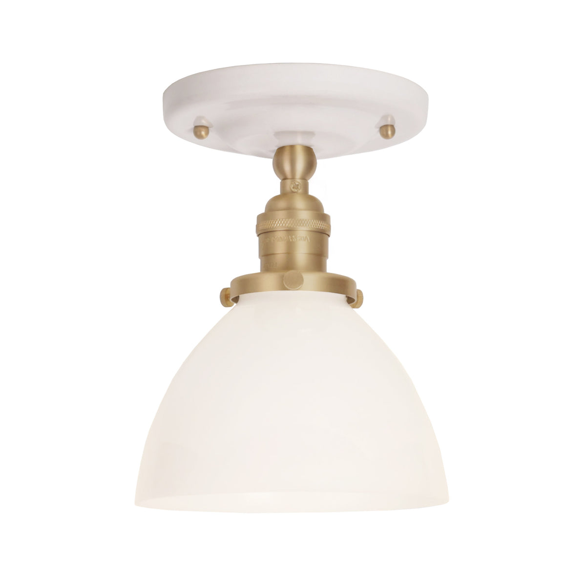 Grace Surface shown in Brass with a Gloss White Ceramic canopy and Opal Glass shade