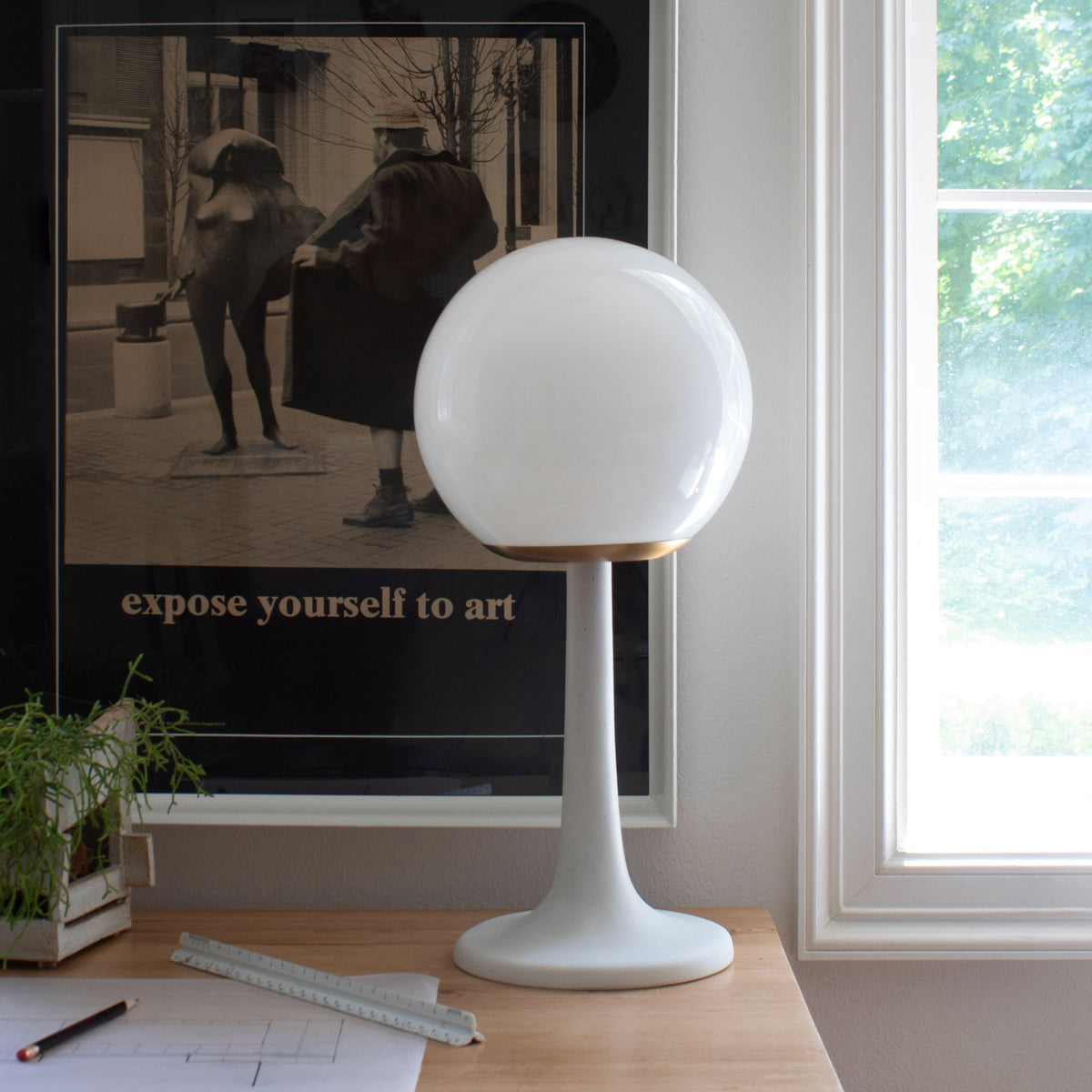 Aaro Lamp shown in Heirloom Brass