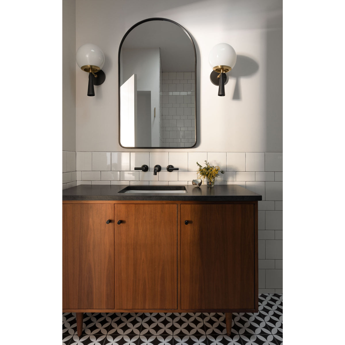 Audrey 8" shown in Matte Black with Brass with an Opal 8" globe. Interior design by Brio Interior Design. Photo by Haris Kenjar