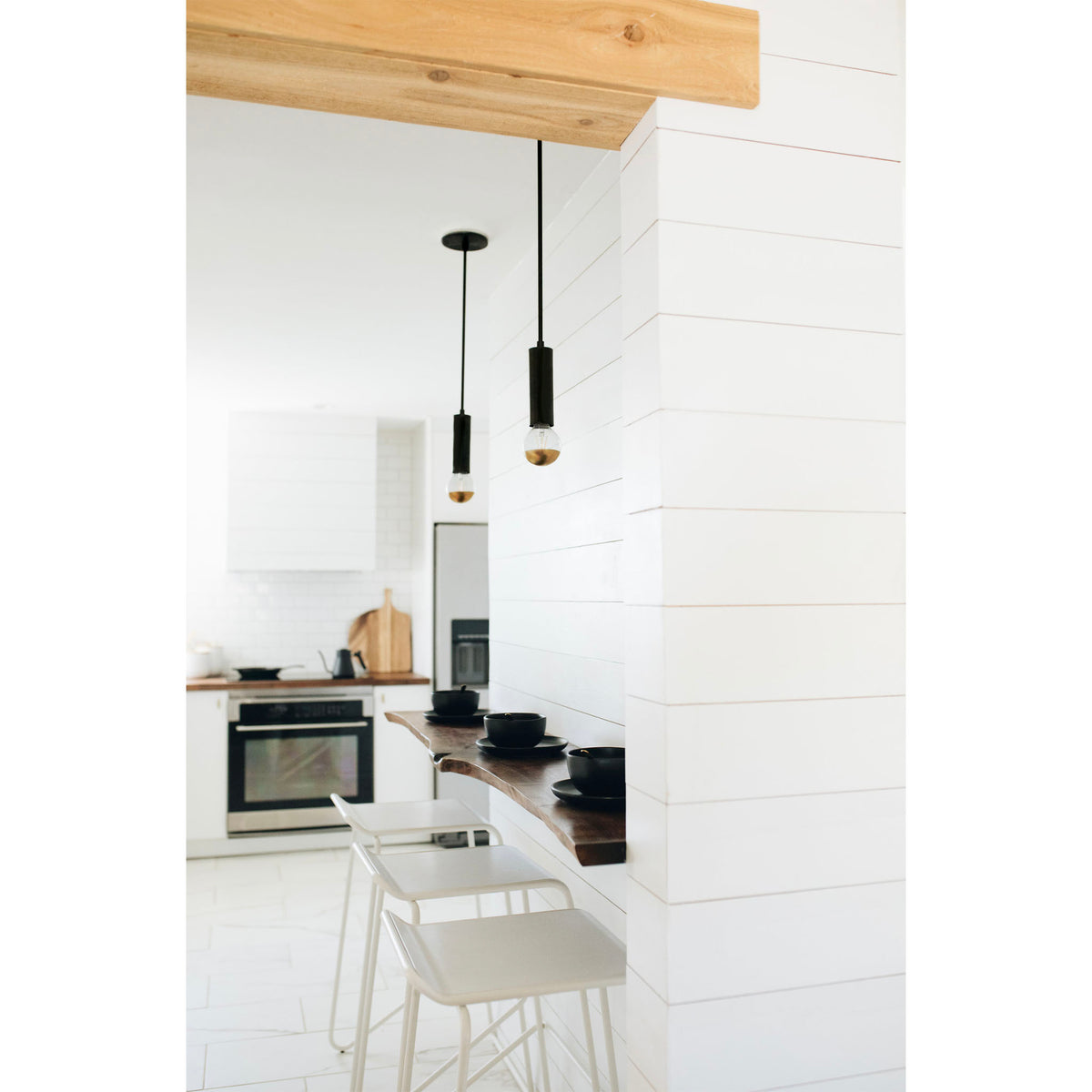 Fjord Rod Pendant shown inMatte Black. Interior design by Stacy Kallen. Photo by Mountainside Photo Co