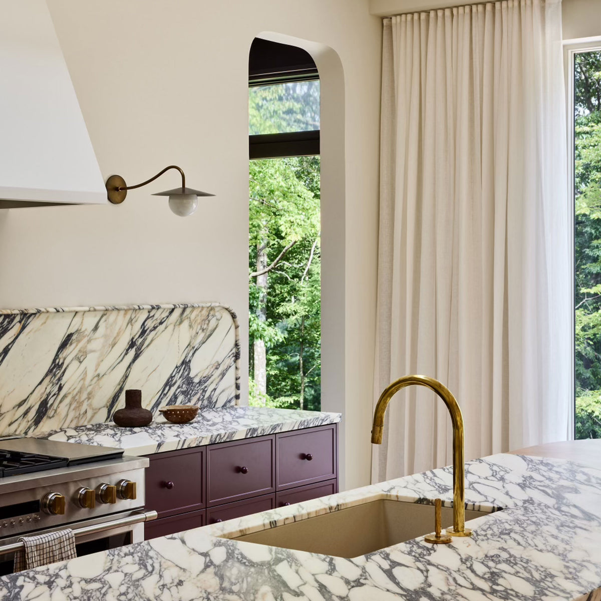 Marie Sconce shown in Heirloom Brass. Interior Design by Sarah Sherman Samuel. Photography by Daniel Peter