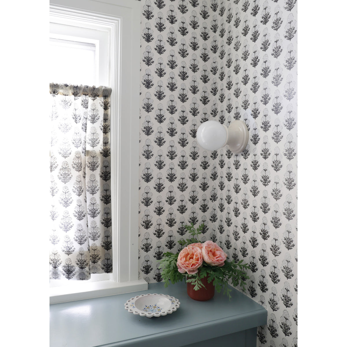 Emma Globe Sconce shown with Gloss White Glaze with Filling Spaces Wallpaper