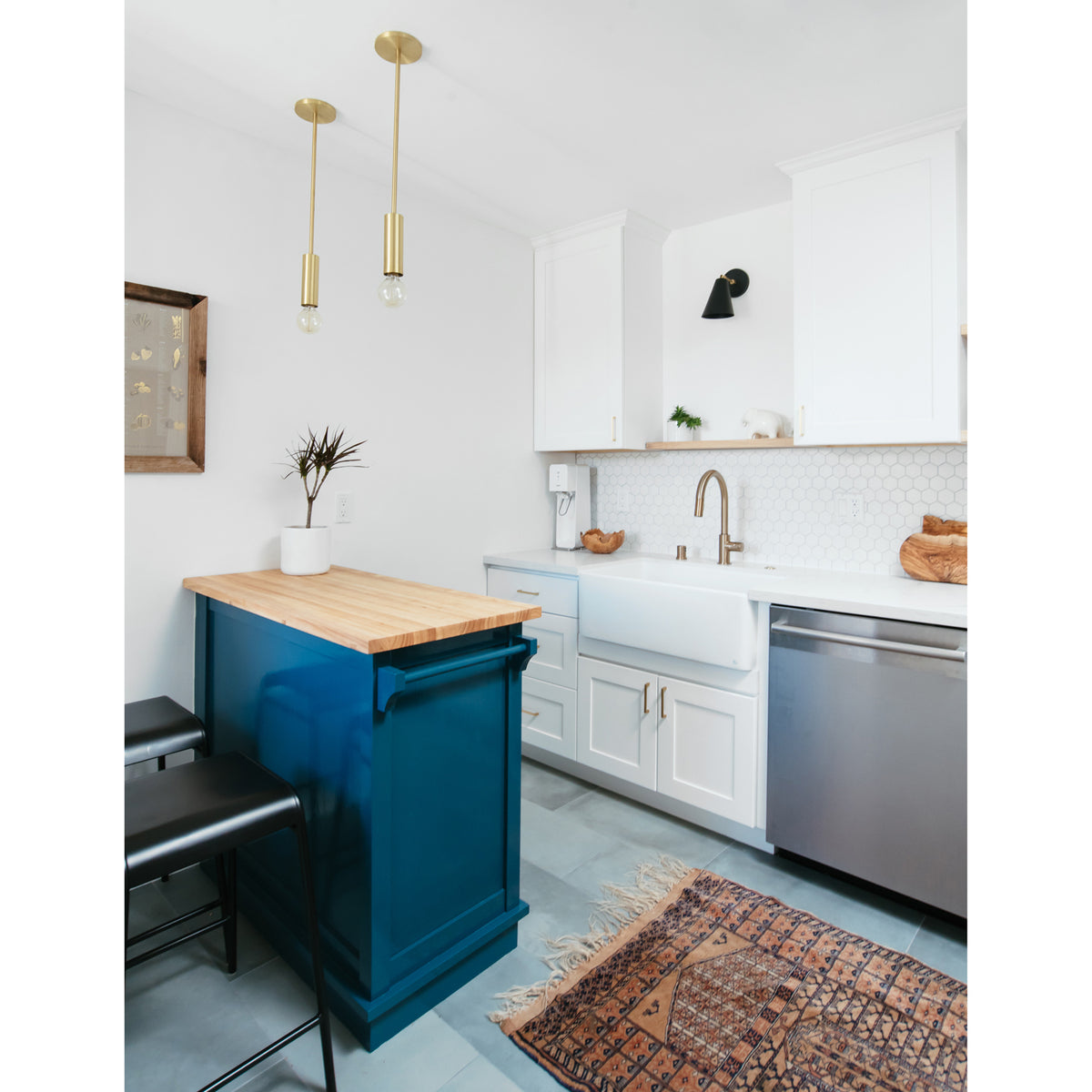 Fjord Rod Pendant shown in Brass. Interior design by Field theory Design. Photo by Ana Kamin