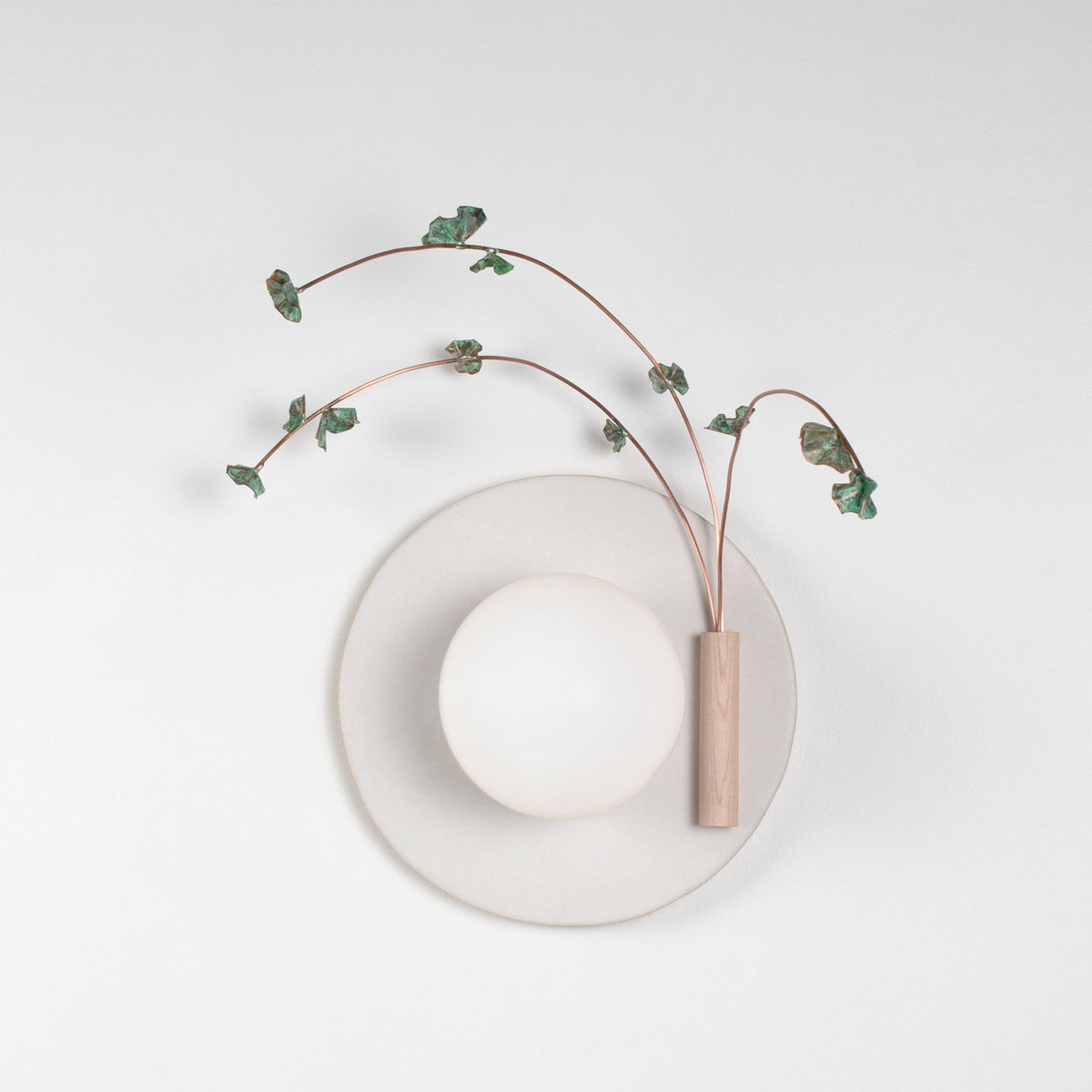Ikebana Sconce shown in Natural White Glaze with Verdigris flower finish and Right mounted vase