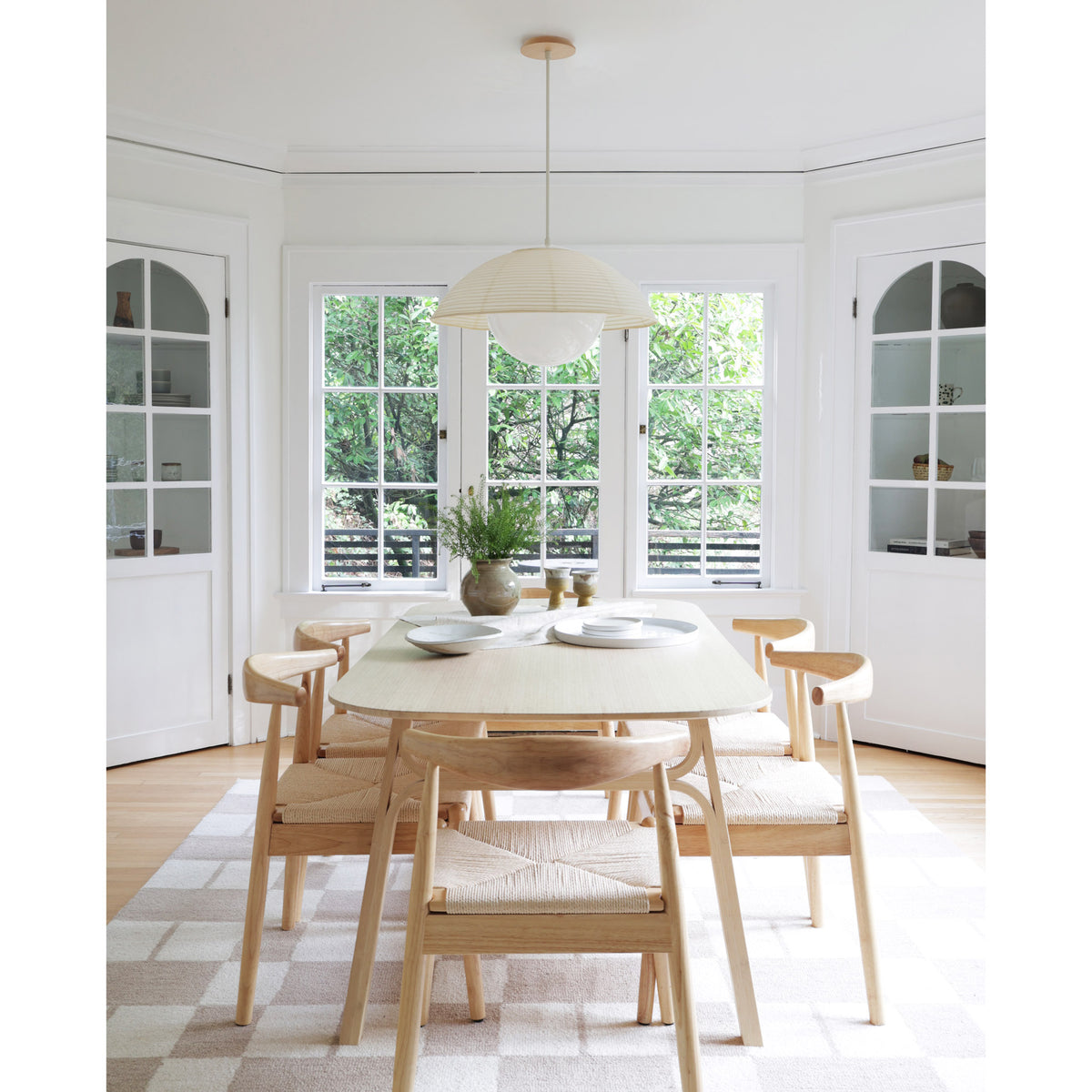 Maru Pendant with Natural Washi Paper shade shown in white with a maple canopy