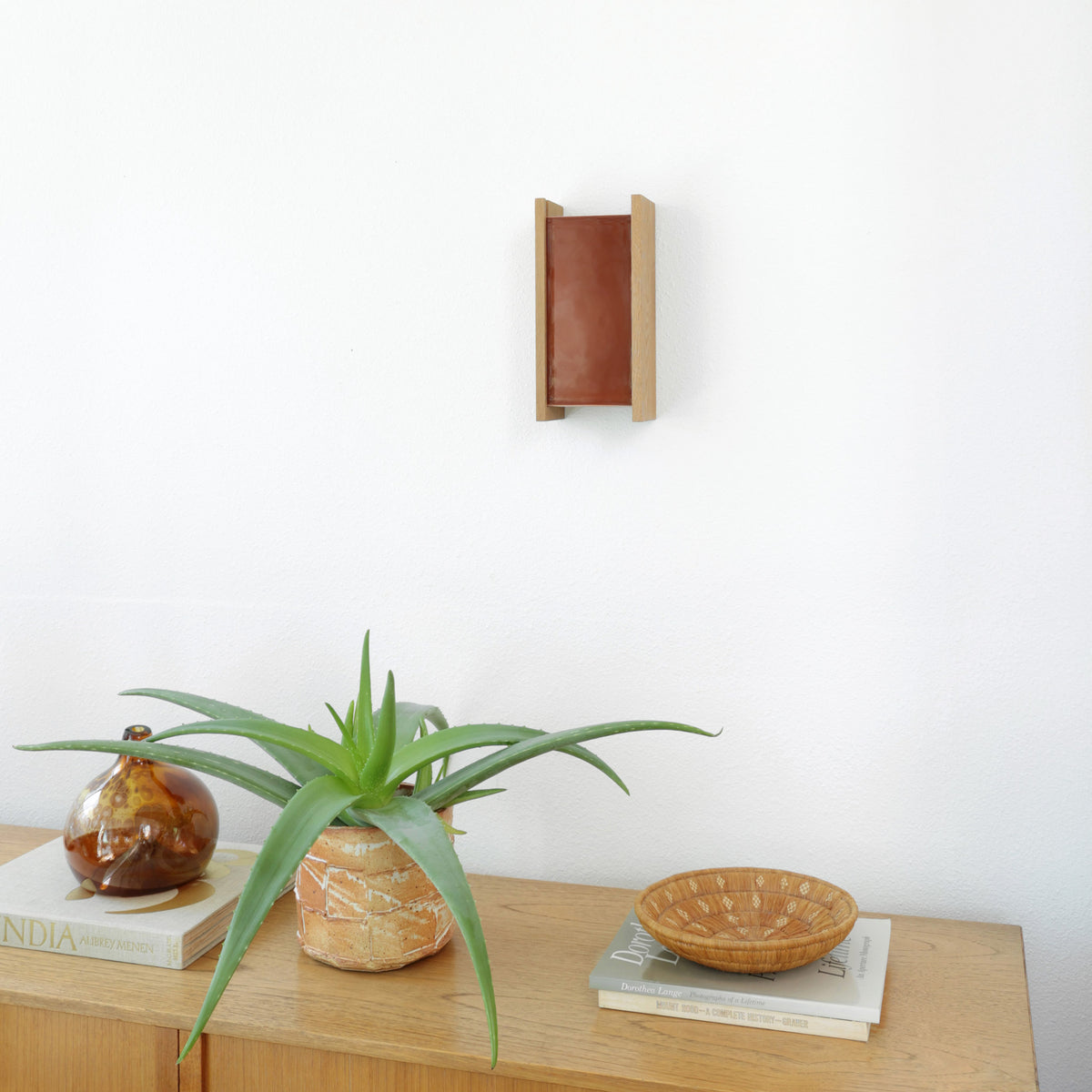 McKenzie Sconce shown in Oak with a Cinnamon Ceramic Finish