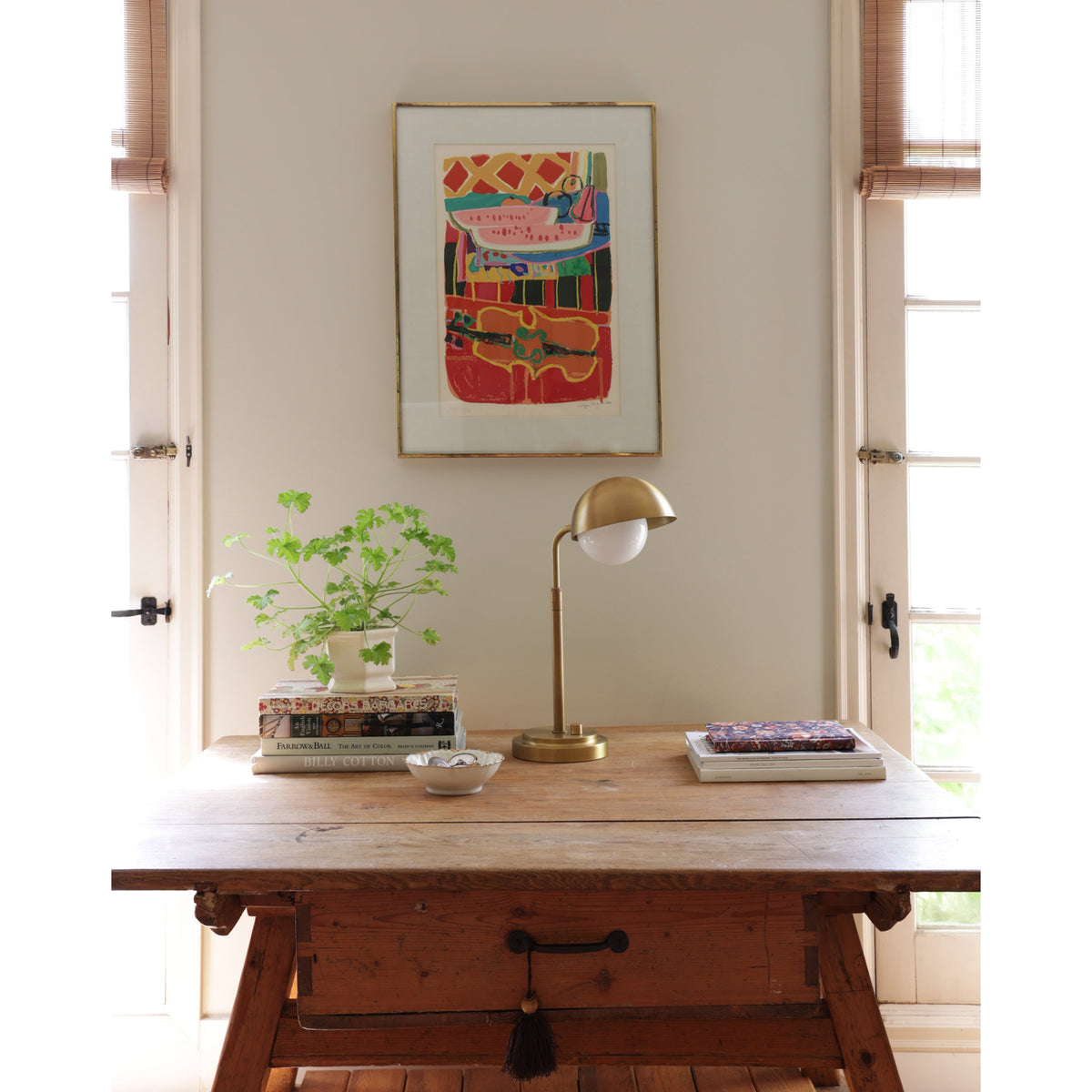 Noor Table Lamp shown in Heirloom Brass. Interior design by Sarah J. Meyer Design
