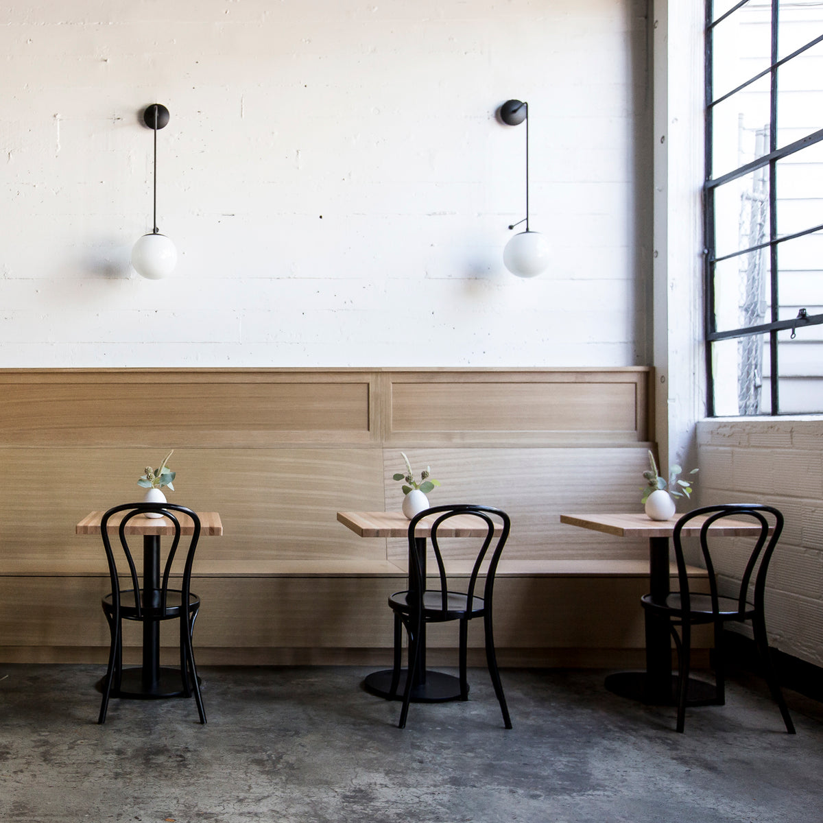 Ramona 10" shown in Matte Black with Opal 10" globes. Interior design by Casey Keasler of Casework Design. Photo by Carly Diaz