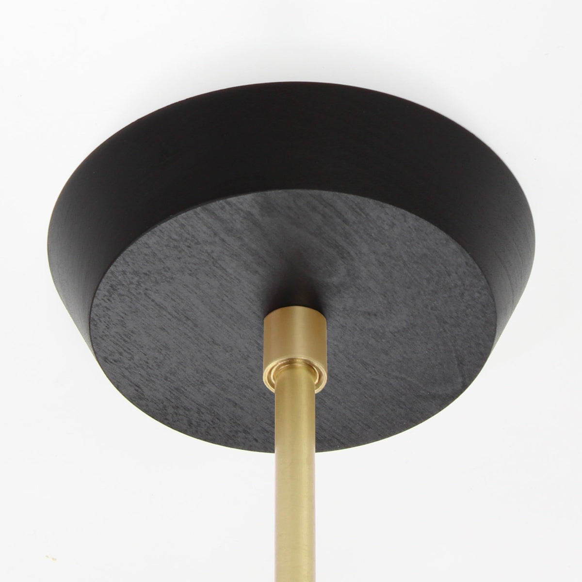 Mounting canopy shown in Black Stained wood finish with Brass rod