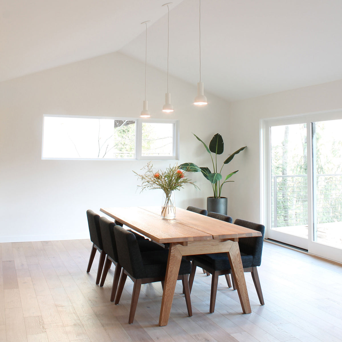 Scout Cord Pendant shown in White with White Cloth cord. Interior design by Teal Davison