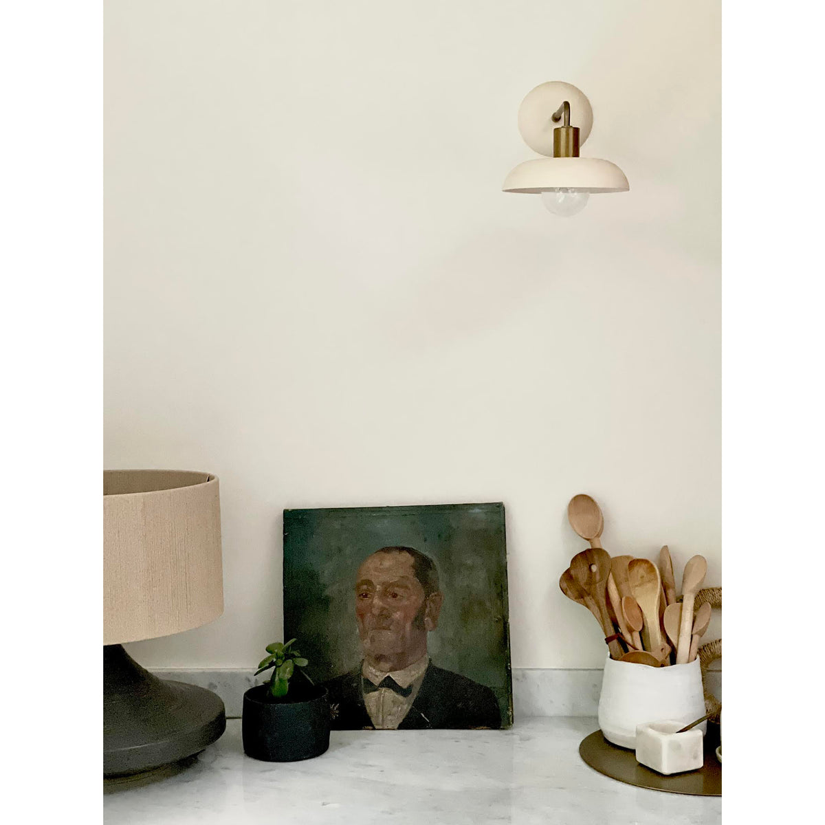 Terra Sconce shown in Bone ceramic with Heirloom Brass, Interior Design and photo by Carey Salvador of Pigeonhole Home Store