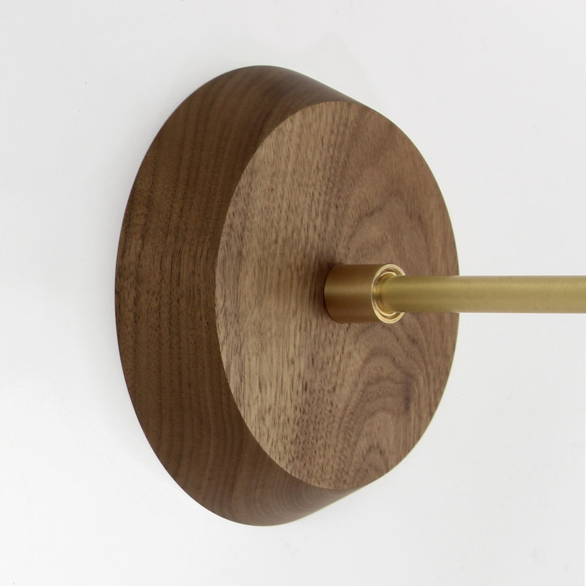 Wood canopy shown in Walnut with Brass arm