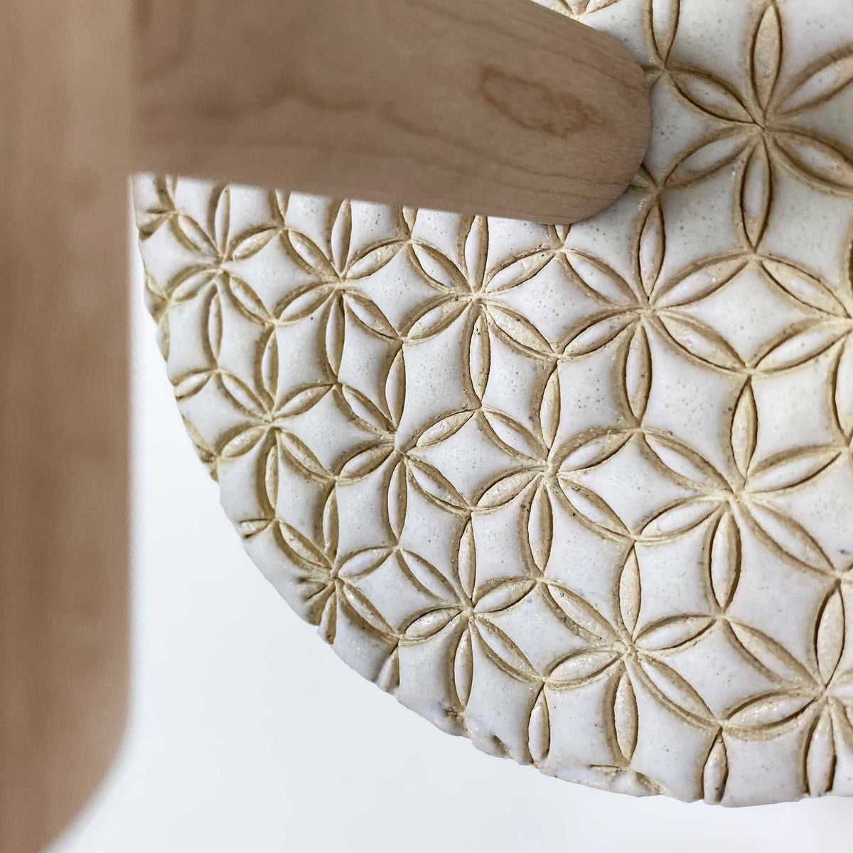 Amherst sconce shown in Maple with Natural White and Cream Quilted Ceramic