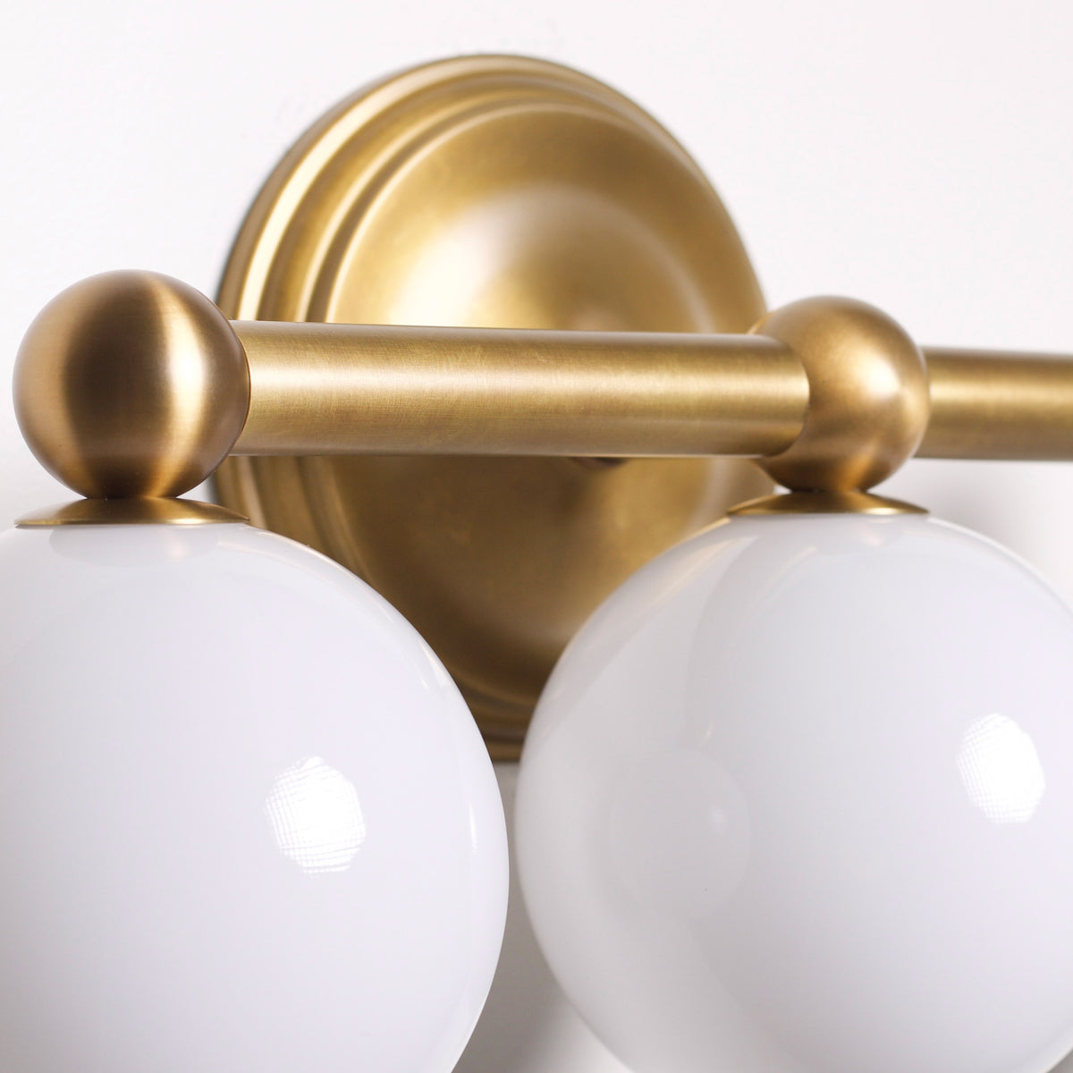 Eleanor Triple shown in Heirloom Brass