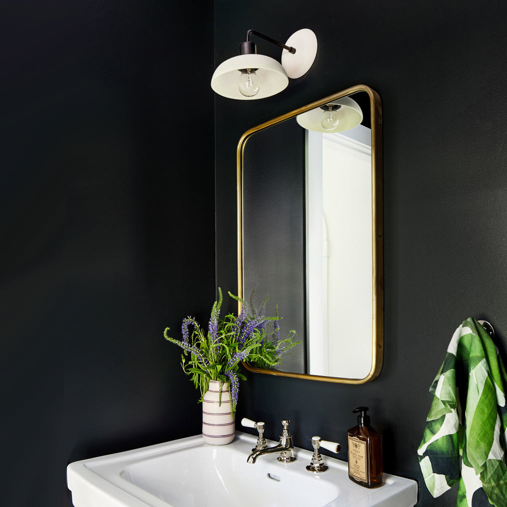 Terra Sconce in Bone with matte black, Interior Design by Zoe Feldman Design, Photography by Stacy Zarin Goldberg