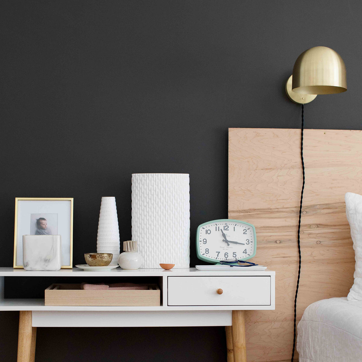 Amélie Sconce 8" shown in Brass with a Black Twisted Cloth cord. Interior Design by Erin Barrett of Sunwoven. Photo by Margeret Wright