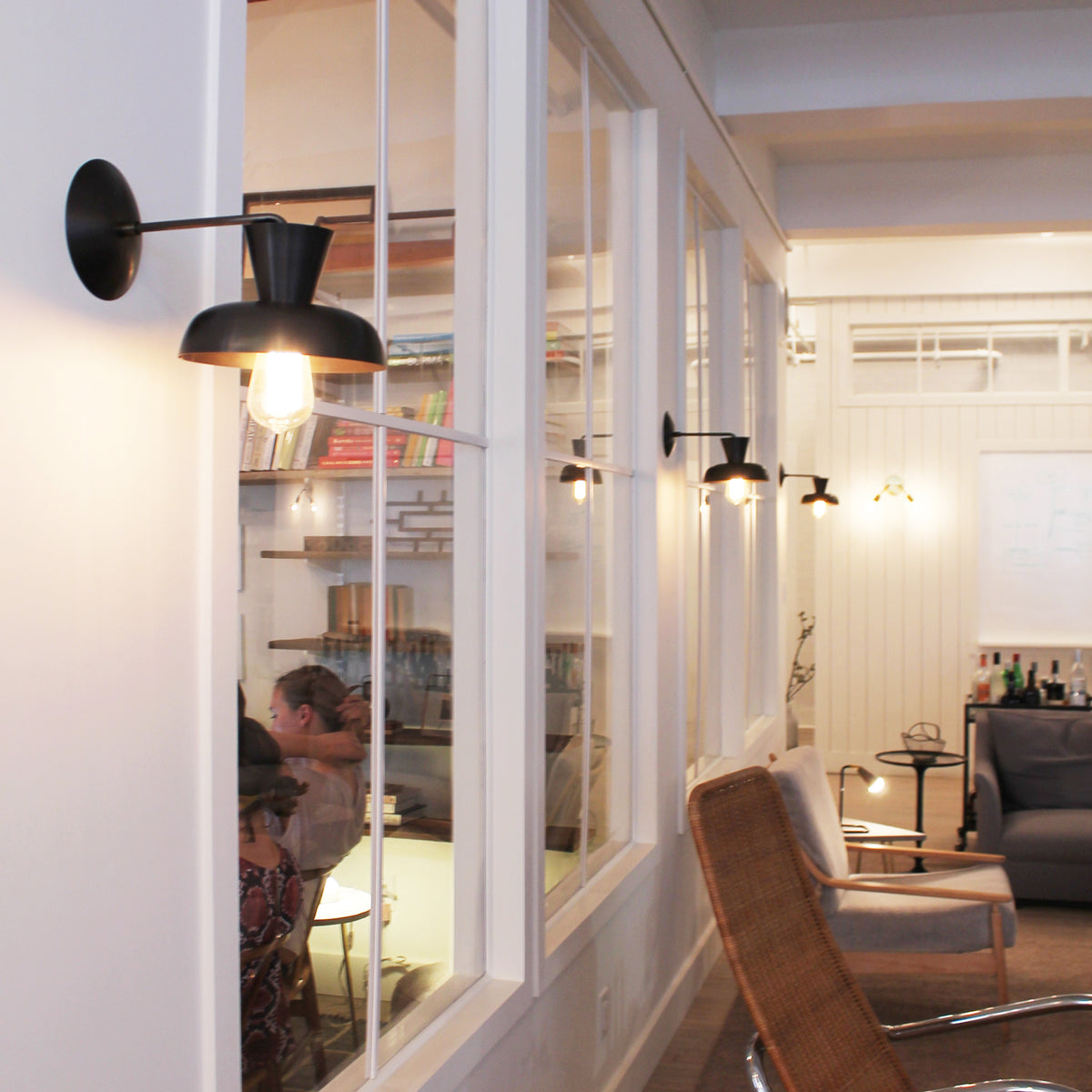 Isle Sconces shown in Matte Black. Interior Design by B Sherman Workshop