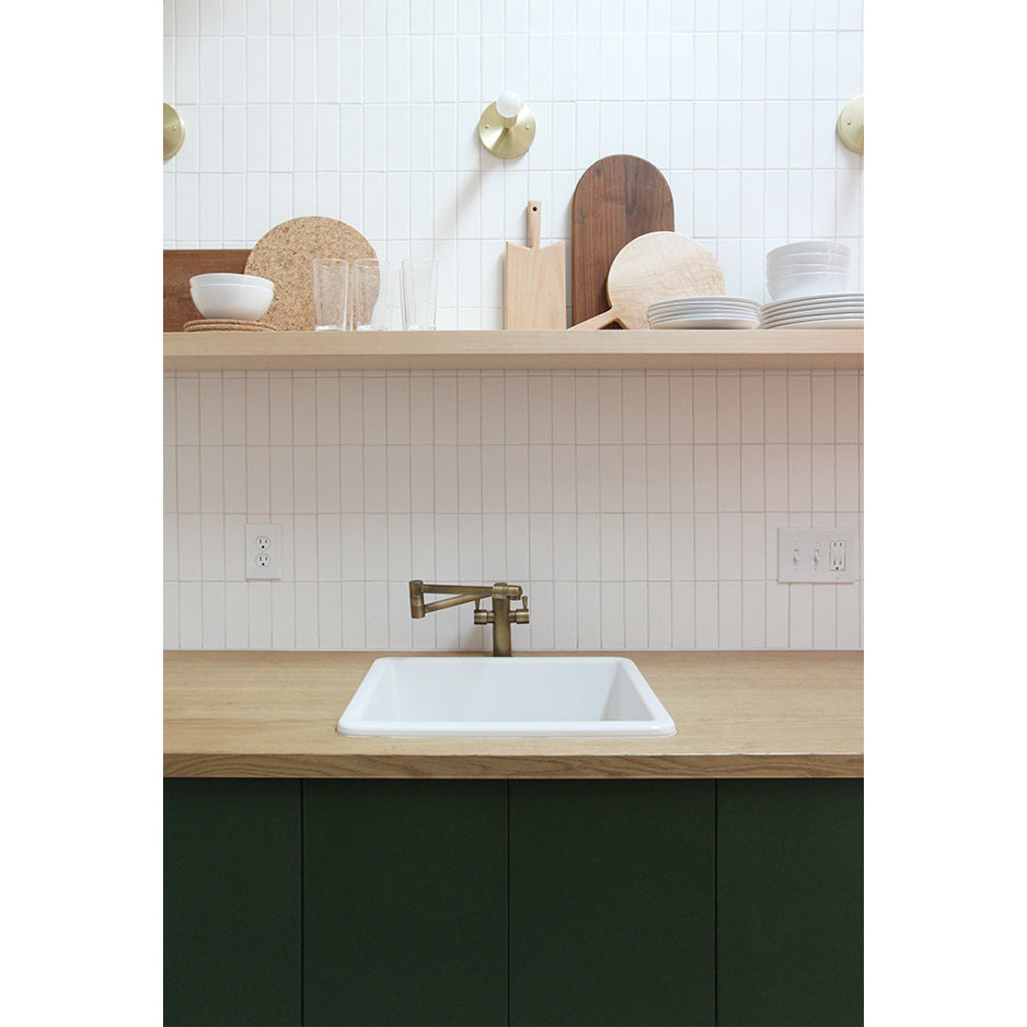 Timberline Surface shown in Brass. Interior Design by Sarah Sherman Samuel for Smitten Studio