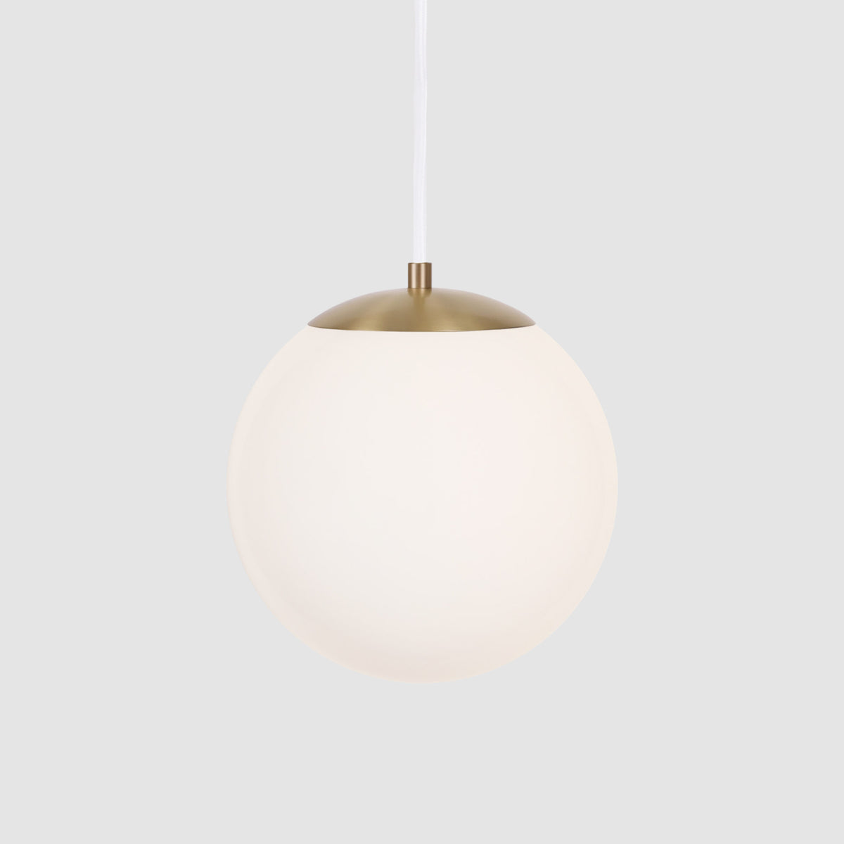 Alto Cord 10" shown in Brass with White Cloth Cord and an Opal 10” Globe