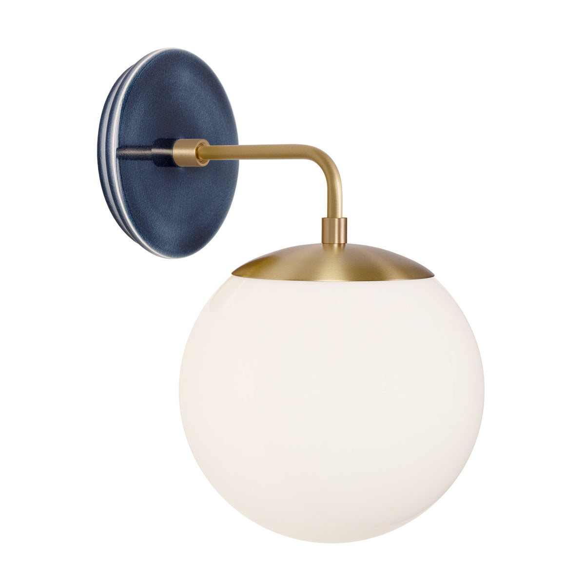 Alto Sconce 8” shown in Brass with an Indigo Blue Swift Ceramic Canopy