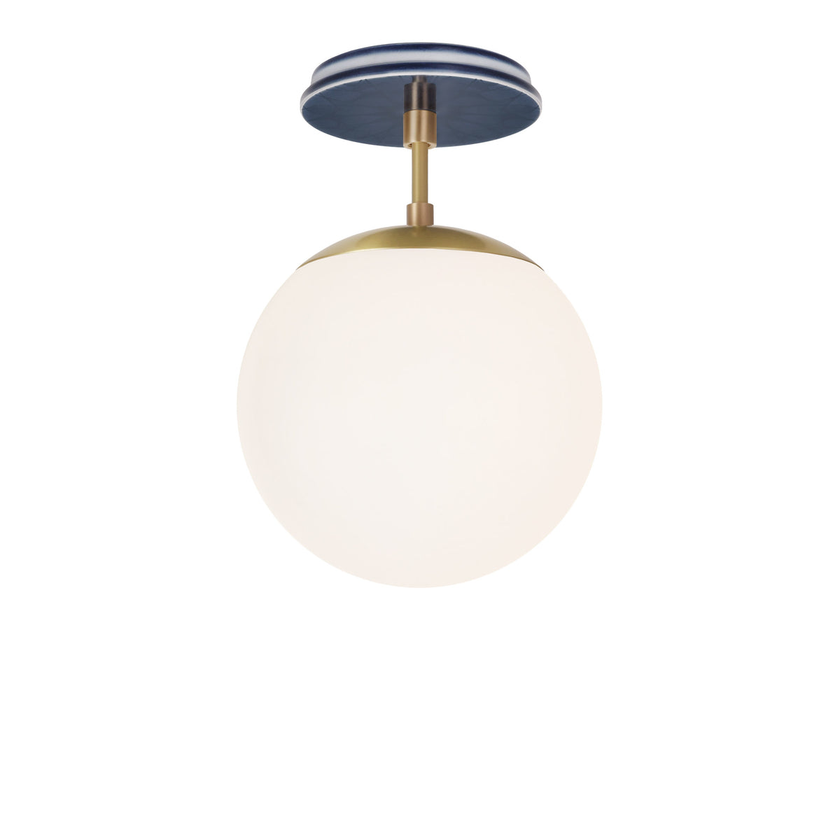 Alto Surface 8" shown in Brass with an Indigo Blue Star Ceramic Canopy