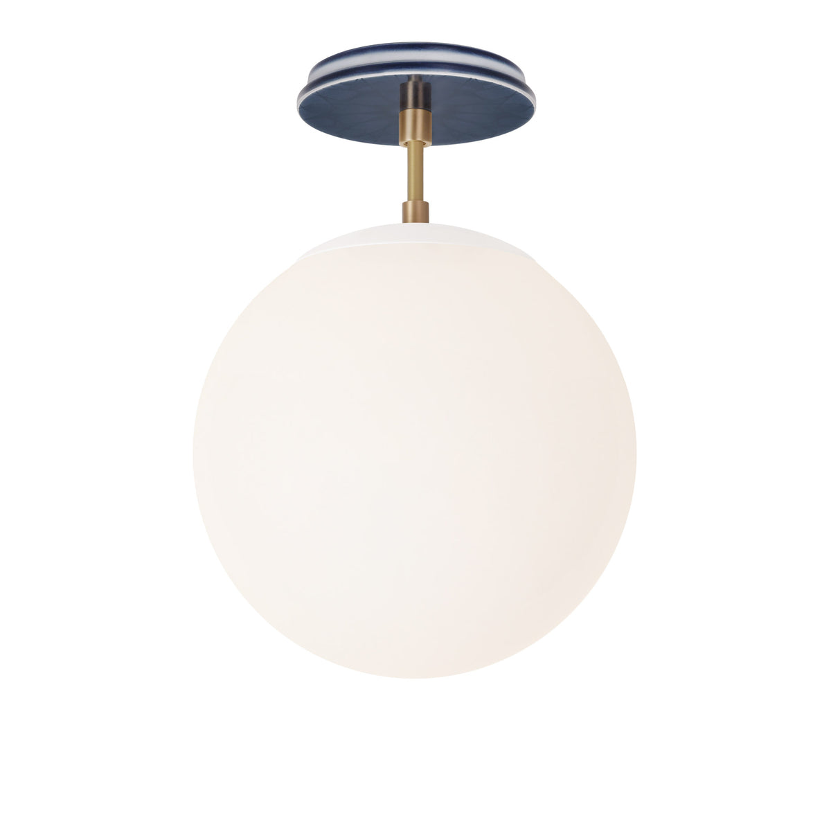 Alto Surface 10” shown in White with Brass and an Indigo Blue Star Ceramic Canopy