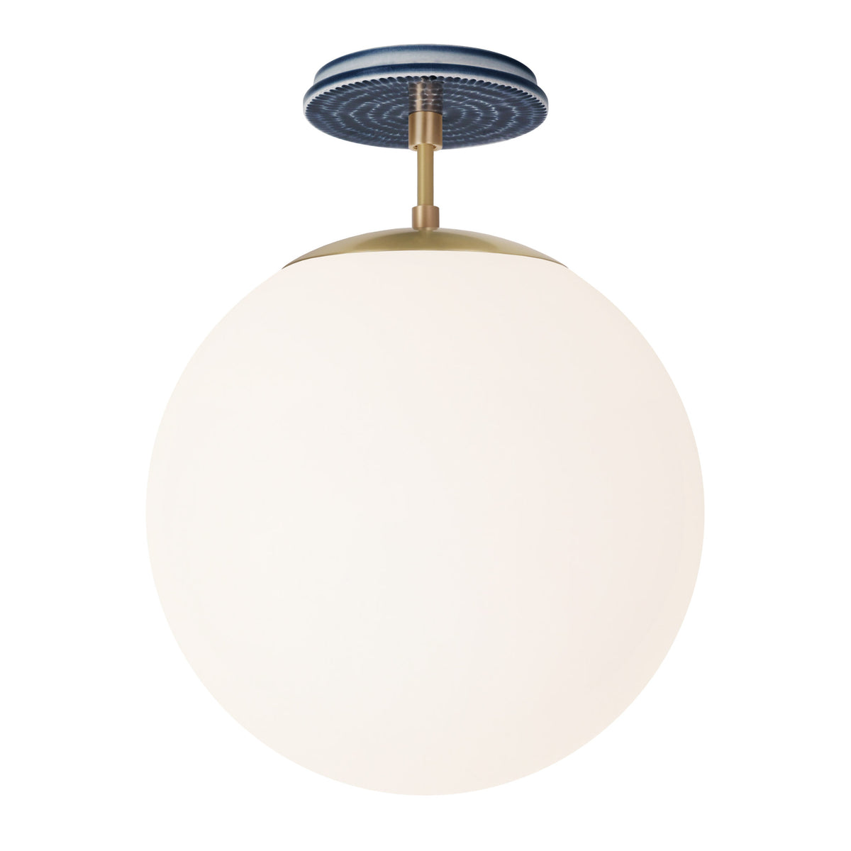 Alto Surface 12” shown in Brass with an Indigo Blue Sunflower Ceramic Canopy