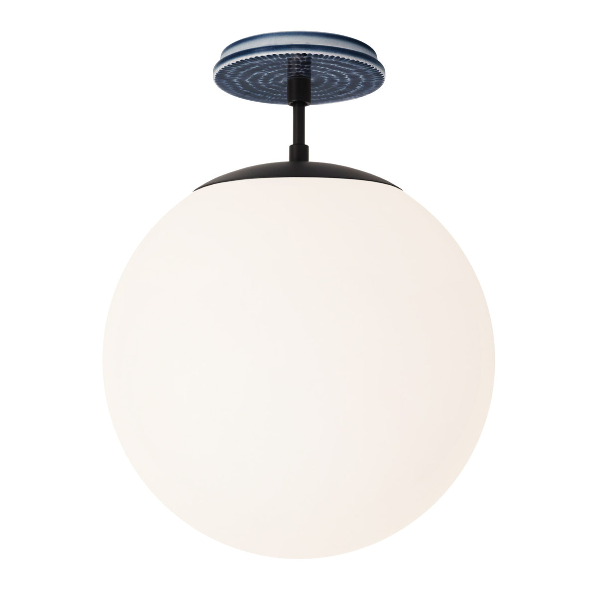 Alto Surface 12” shown in Matte Black with an Indigo Blue Sunflower Ceramic Canopy