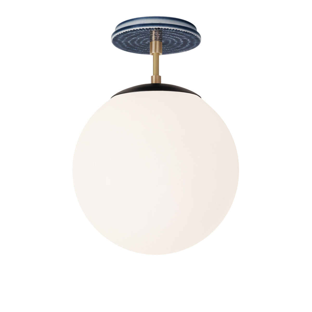 Alto Surface 10” shown in Matte Black with Brass and an Indigo Blue Sunflower Ceramic Canopy