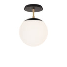 Alto Surface 8" shown in Matte Black with Brass and a Black Stained Wood Canopy