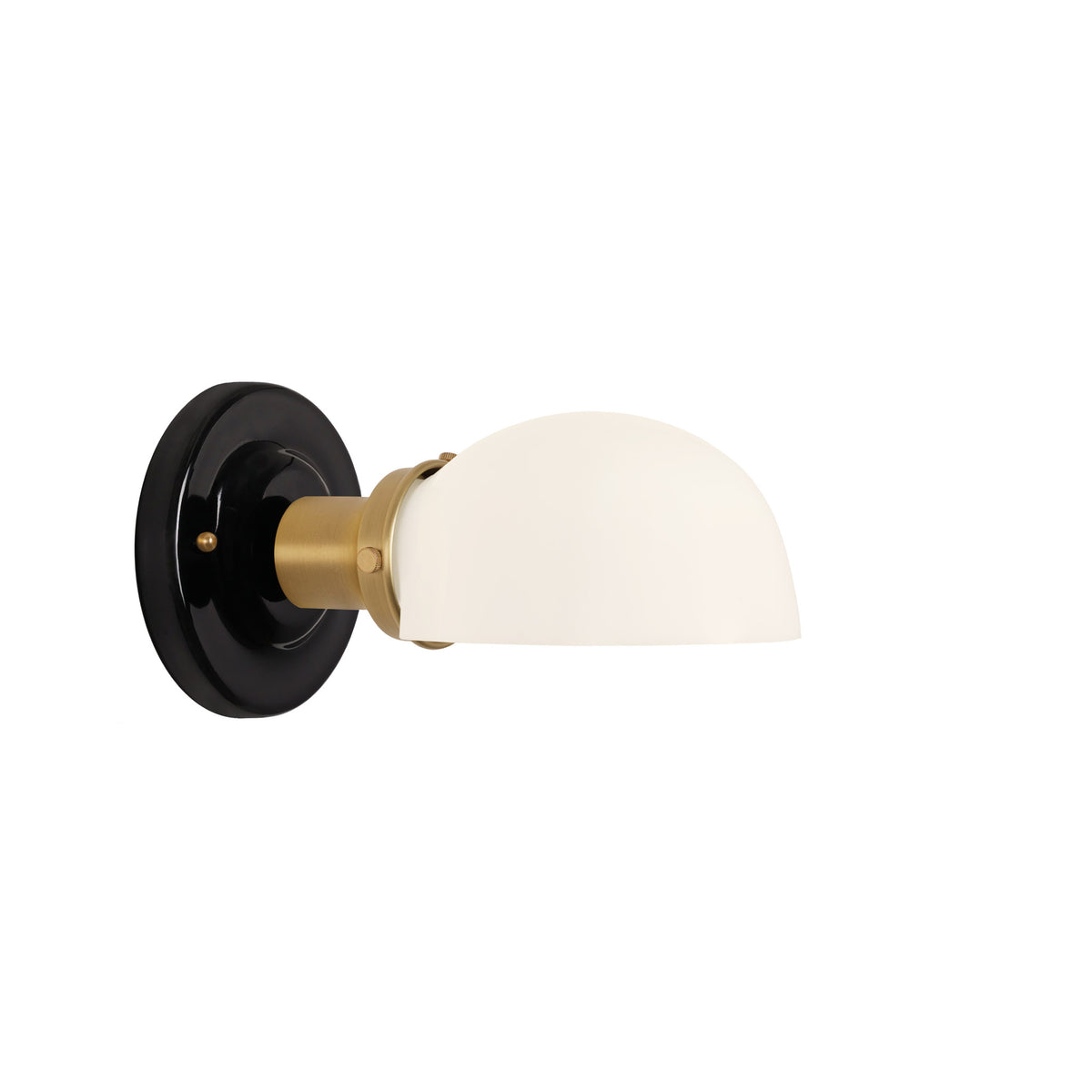 Archie Single shown in Heirloom Brass with a Gloss Black Ceramic Canopy