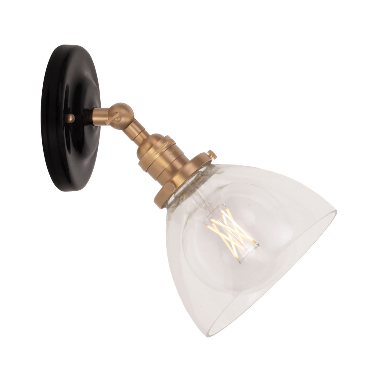 Grace Flush Sconce shown in Heirloom Brass with a Gloss Black Ceramic canopy and Clear Glass shade