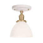 Grace Surface shown in Brass with a Gloss White Ceramic canopy and Opal Glass shade