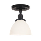 Grace Surface shown in Graphite Patina with a Gloss Black Ceramic canopy and an Opal Glass shade