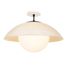 Maru Surface with a Natural shade shown in Matte Black with a Bone Ceramic canopy