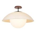 Maru Surface with a Natural shade shown in Matte Black with a Walnut Wood canopy