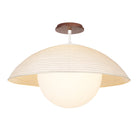 Maru Surface with a Natural shade shown in White with a Walnut Wood canopy