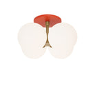 Selene Compass Surface shown in Heirloom Brass with a Persimmon Canopy