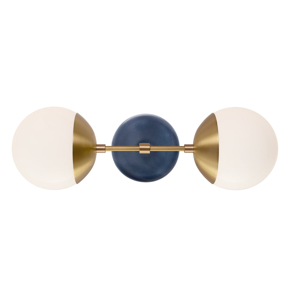 Theo shown in Heirloom Brass with an Indigo Blue Swift Ceramic Canopy