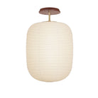 Umi Surface shown in Brass with a Walnut Wood Canopy